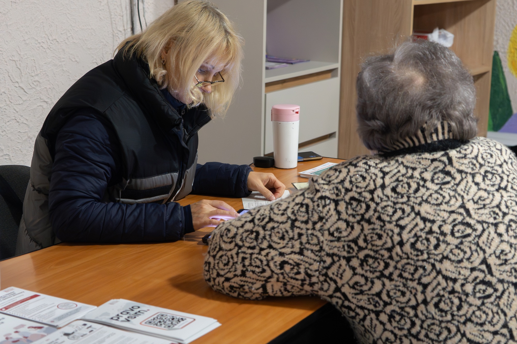 Registration for humanitarian support in a basement in Kherson. ©NGO City of Power, 2025, Kherson