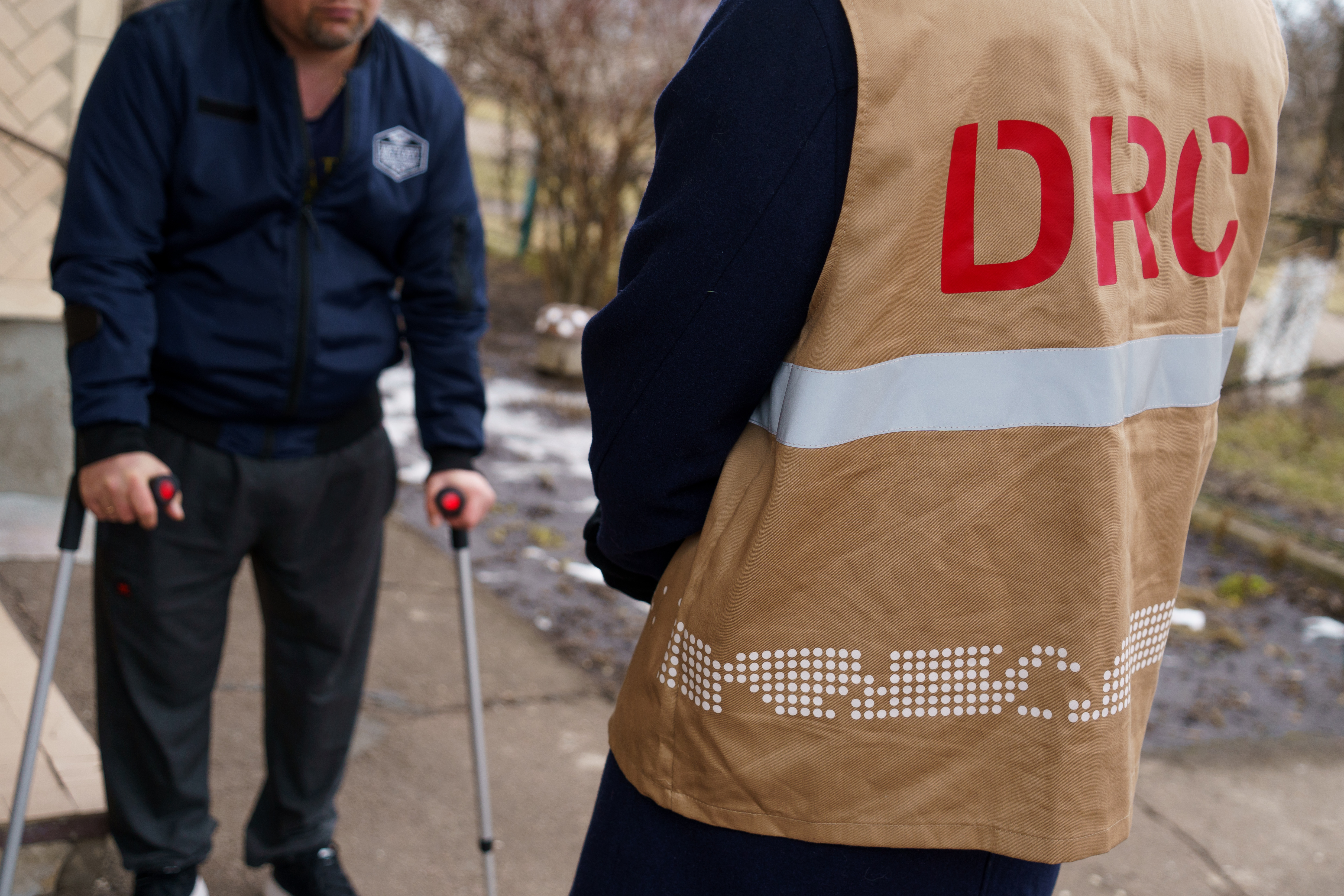 After a long treatment process, Ostap can stand and walk using crutches.©DRC Ukraine, Chernihiv Oblast, February 2023, Volodymyr Cheppel. 