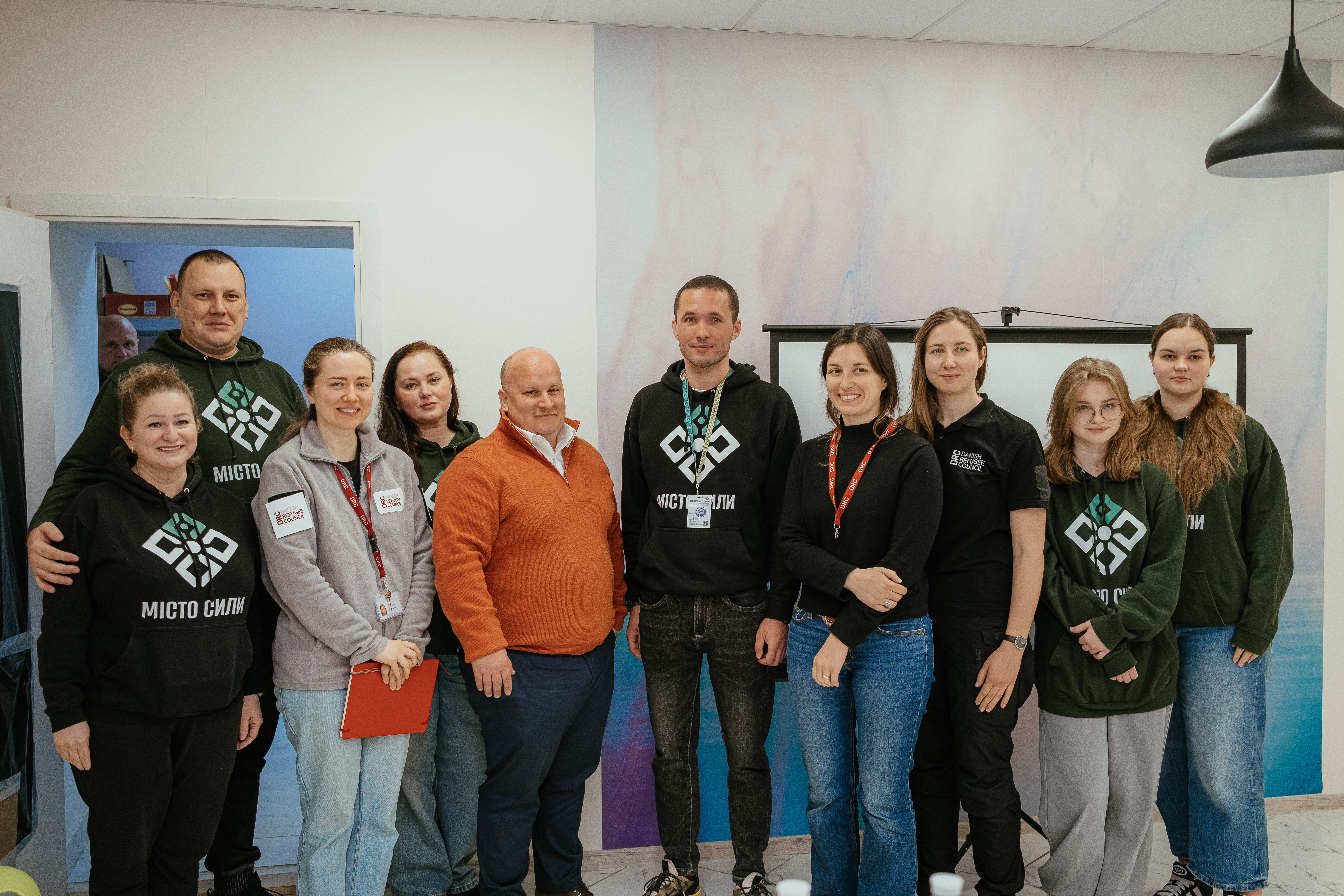 Representatives of Misto Syly and Danish Refugee Council teams during a joint coordination meeting in Kherson. ©DRC Ukraine, Krystyna Pashkina, March 2025.