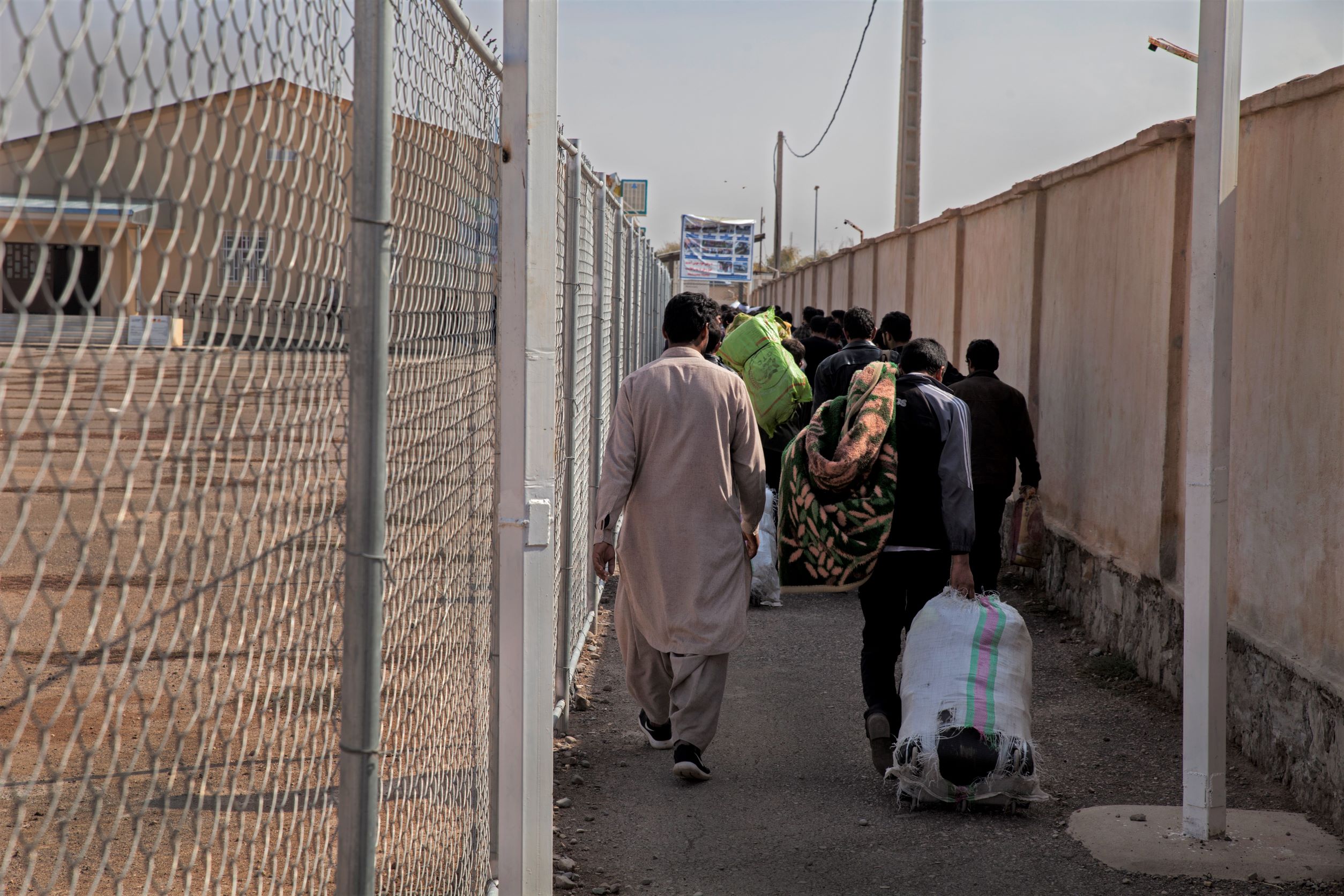 Afghan deportees return from Iran through Islam Qala border crossing, Herat province, November 2019.